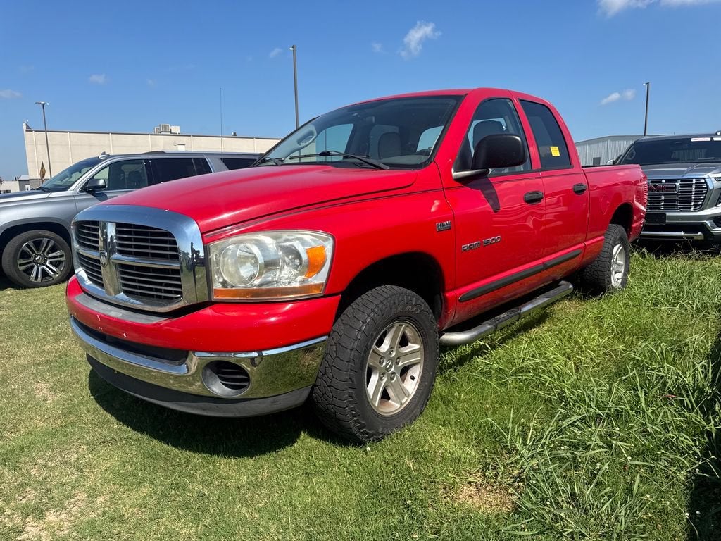 2006 Dodge Ram 1500 SLT in Flame Red Clearco — front three-quarter view