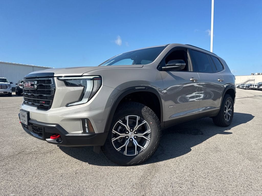 2026 GMC Acadia AT4 in Riverstone Metallic — front three-quarter view