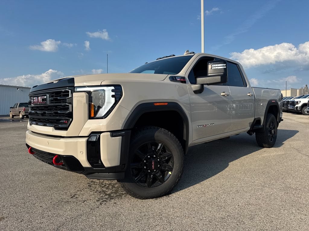 2026 GMC Sierra 2500 HD AT4 in Coastal Dune — front three-quarter view