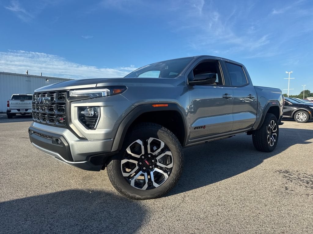 2026 GMC Canyon AT4 in Sterling Metallic — front three-quarter view