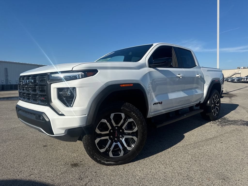 2026 GMC Canyon AT4 in Summit White — front three-quarter view