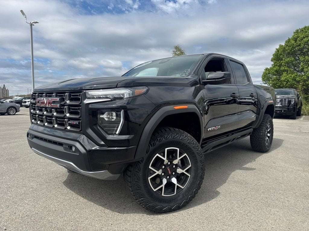 2026 GMC Canyon AT4X in Onyx Black — front three-quarter view