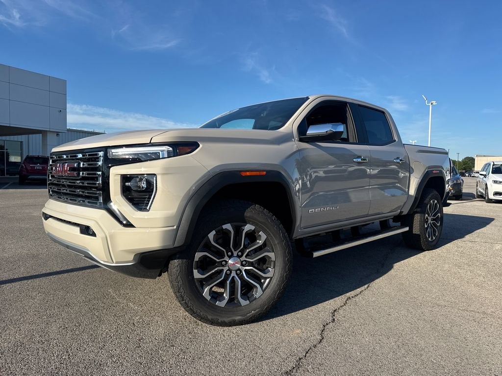 2026 GMC Canyon Denali in Coastal Dune — front three-quarter view