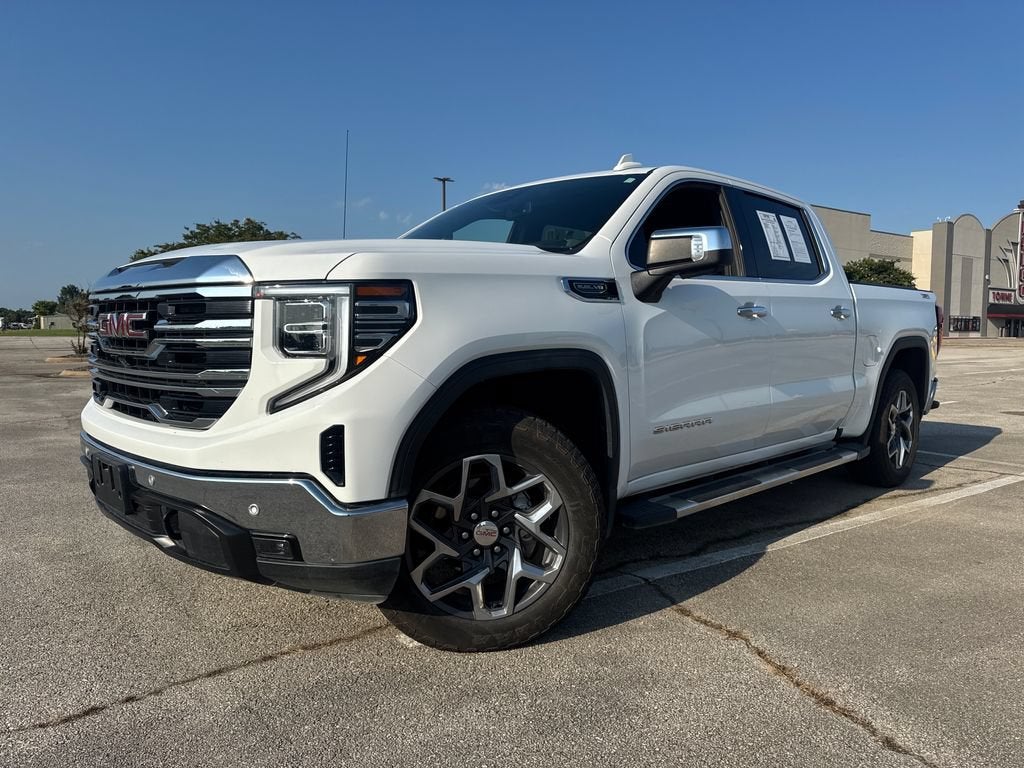 2024 GMC Sierra 1500 SLT in Summit White — front three-quarter view