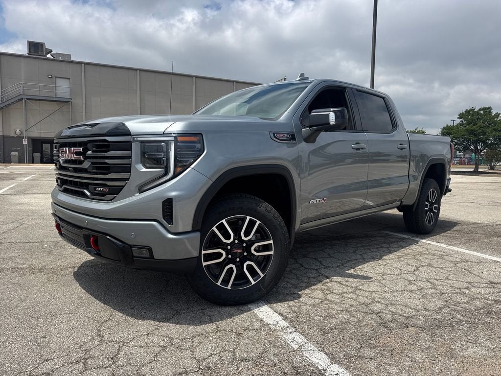 2026 GMC Sierra 1500 AT4 in Sterling Metallic — front three-quarter view