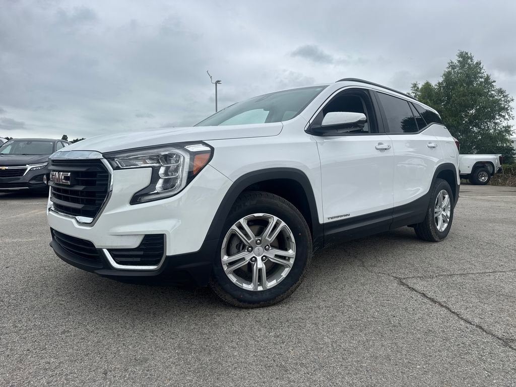 2023 GMC Terrain SLE in Summit White — front three-quarter view