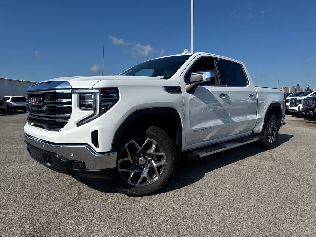 2026 GMC Sierra 1500 SLT in Summit White — front three-quarter view