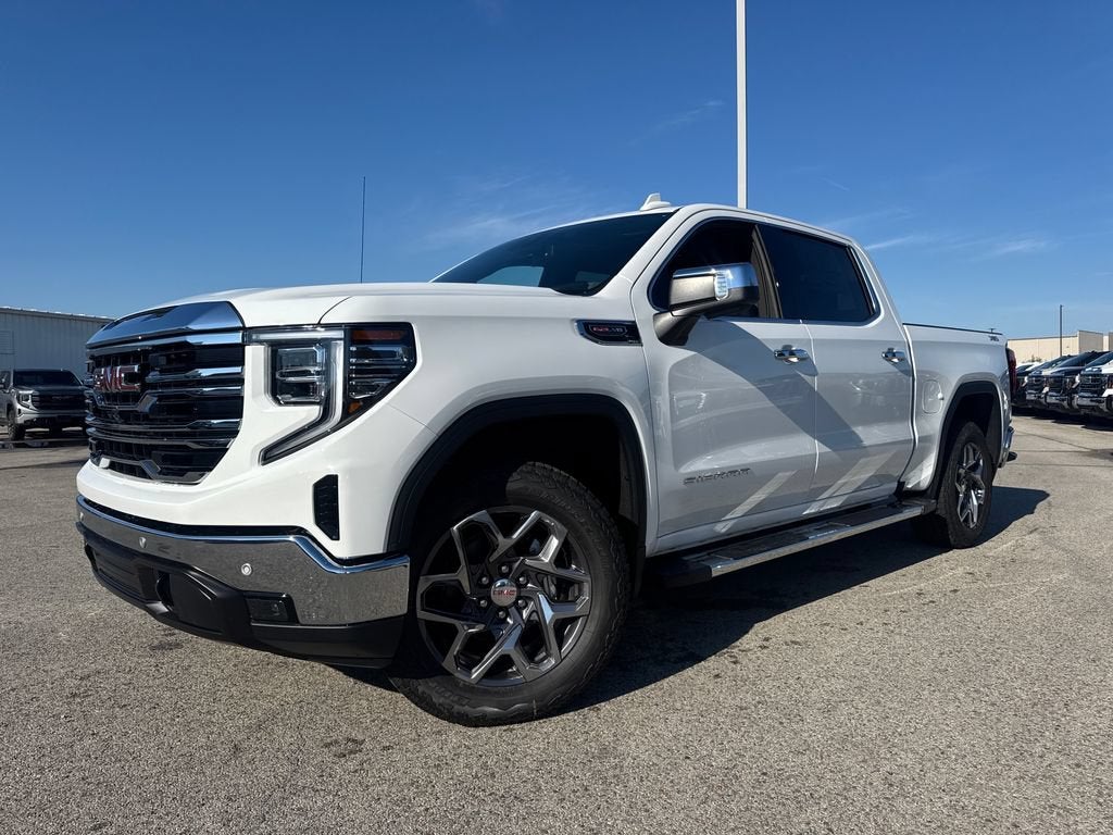 2026 GMC Sierra 1500 SLT in Summit White — front three-quarter view