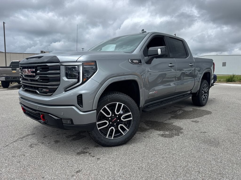 2026 GMC Sierra 1500 AT4 in Sterling Metallic — front three-quarter view