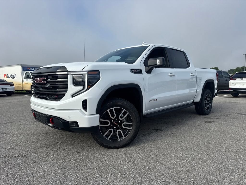 2026 GMC Sierra 1500 AT4 in Summit White — front three-quarter view