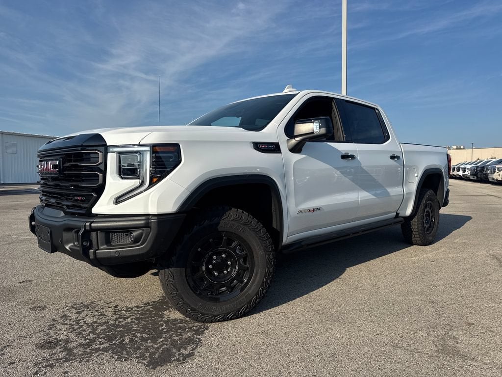 2026 GMC Sierra 1500 AT4X in Summit White — front three-quarter view