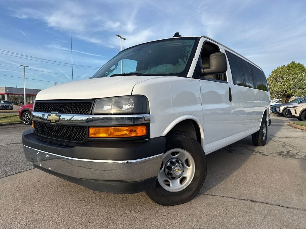 2024 Chevrolet Express Passenger 3500 1LT in Summit White — front three-quarter view