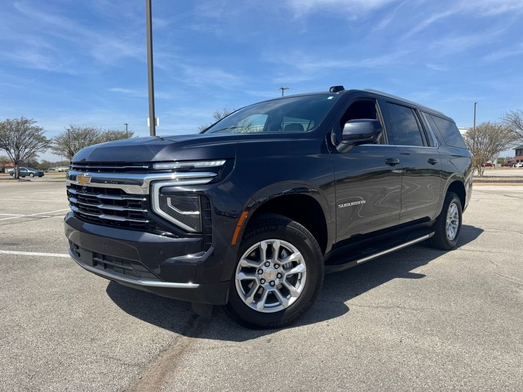 2025 Chevrolet Suburban LT in Dark Ash Metallic — front three-quarter view