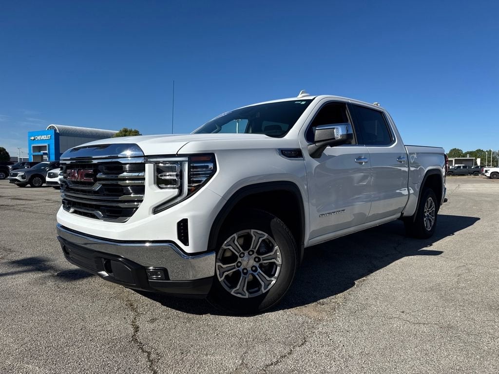 2025 GMC Sierra 1500 SLT in Summit White — front three-quarter view