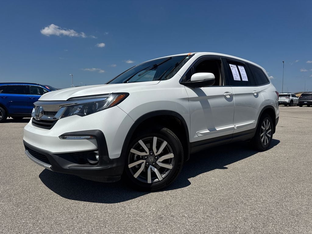 2022 Honda Pilot EX-L in White — front three-quarter view