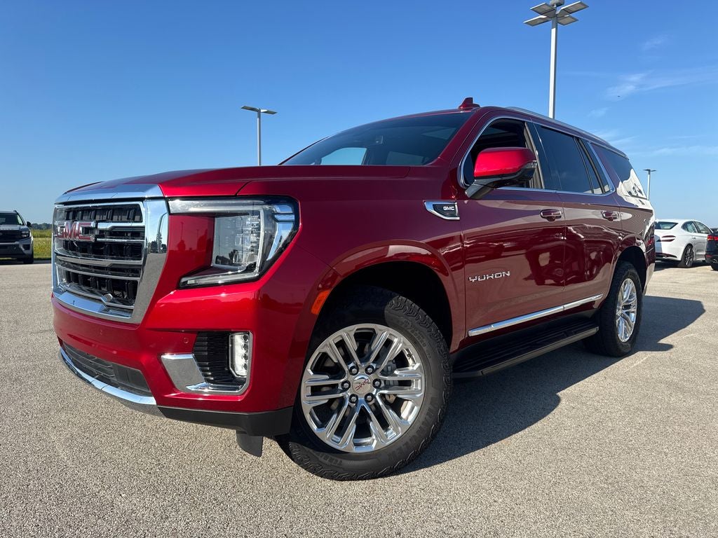 2022 GMC Yukon SLT in Cayenne Red — front three-quarter view