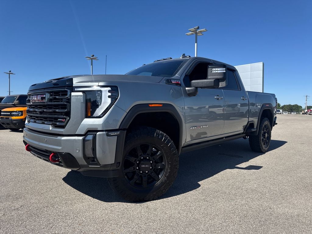 2024 GMC Sierra 2500HD AT4 in Sterling Metallic — front three-quarter view
