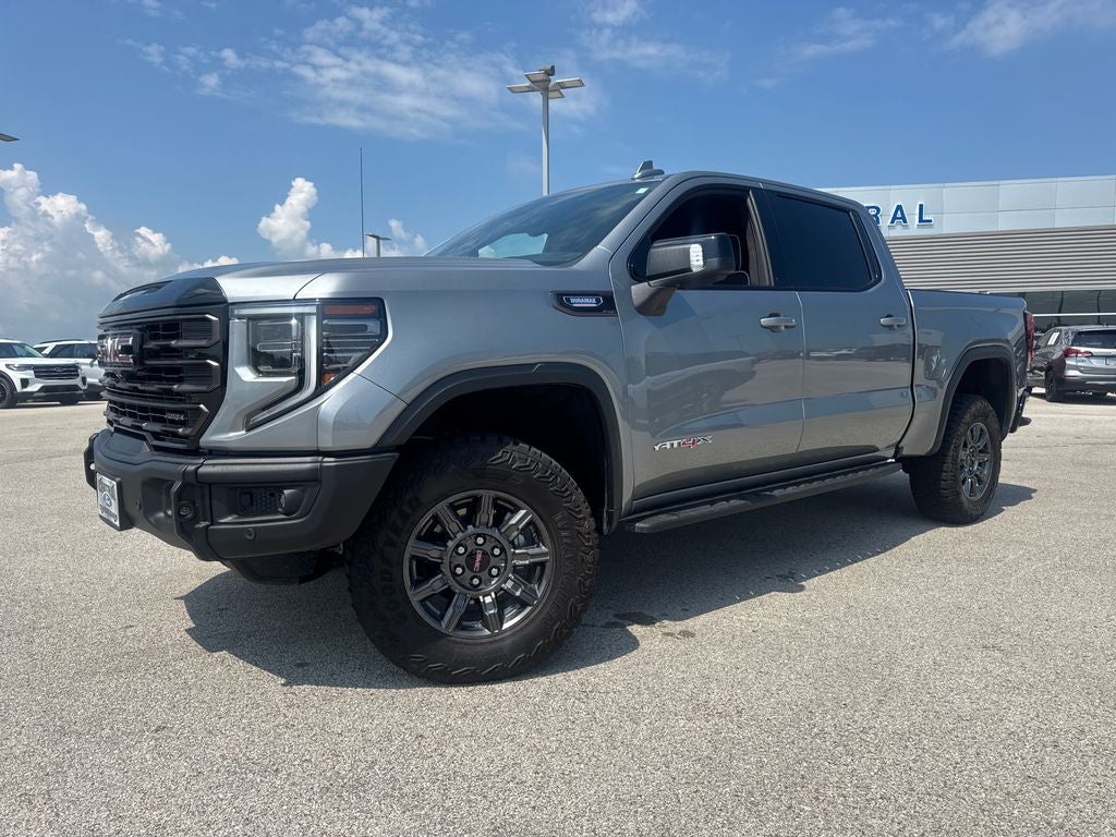 2026 GMC Sierra 1500 AT4X in Sterling Metallic — front three-quarter view